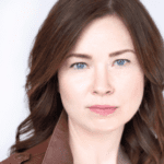 Headshot of Emily Tate.
