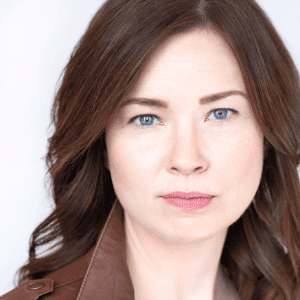 Headshot of Emily Tate.