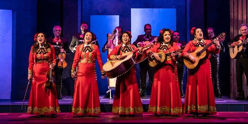 singing stage performers with instruments