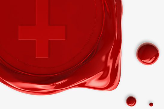 An upside-down cross is imprinted by a seal inside a splotch of blood red wax.