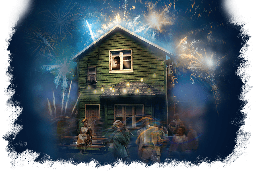 A green house with a person looking out from an upstairs window, surrounded by fireworks and blurred people outside at night.