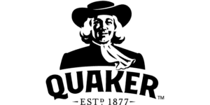 Black and white Quaker Oats logo featuring a smiling man in traditional Quaker attire above the word "QUAKER" and "EST. 1877.