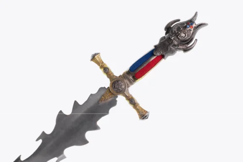 A decorative sword with a wavy blade, ornate crossguard, and a handle featuring red and blue accents and an intricate face design on the pommel.