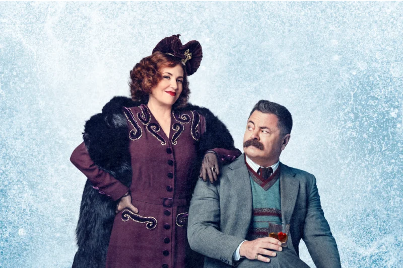 A woman in a vintage purple outfit and fur stole stands beside a seated man in a suit holding a drink, against an icy blue textured background.