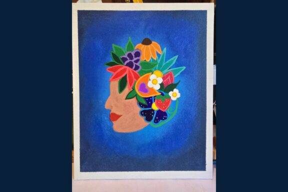A painting of a woman's face in profile on a blue background, with colorful flowers and fruits arranged in her hair.