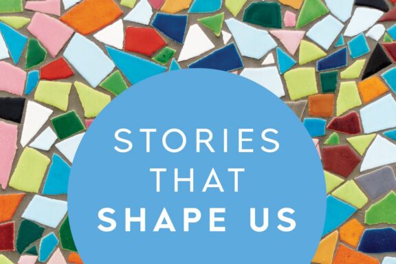 Colorful mosaic tiles surround a blue circle with white text that reads, “Stories That Shape Us.”.